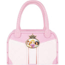 Pink tote bag featuring Disney princesses, with a crown emblem and a textured design.