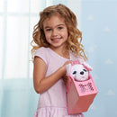 Young girl holding a pink tote with a plush puppy peeking out, smiling happily in a bright indoor setting.