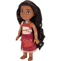 Moana petite doll with long dark hair, wearing a traditional red and white dress and necklace, stands barefoot.
