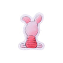 Pooh-inspired nurturing doll by JAKKS Pacific, featuring a soft pink design with prominent ears and a striped body.
