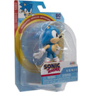 Sonic the Hedgehog action figure by Jakks, featuring articulated limbs, in packaging with warning label and colorful graphics.