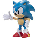 Blue Sonic figurine with outstretched hand, featuring red shoes and white gloves, from Jakks Sonic 2.5In Figures Wave 13.