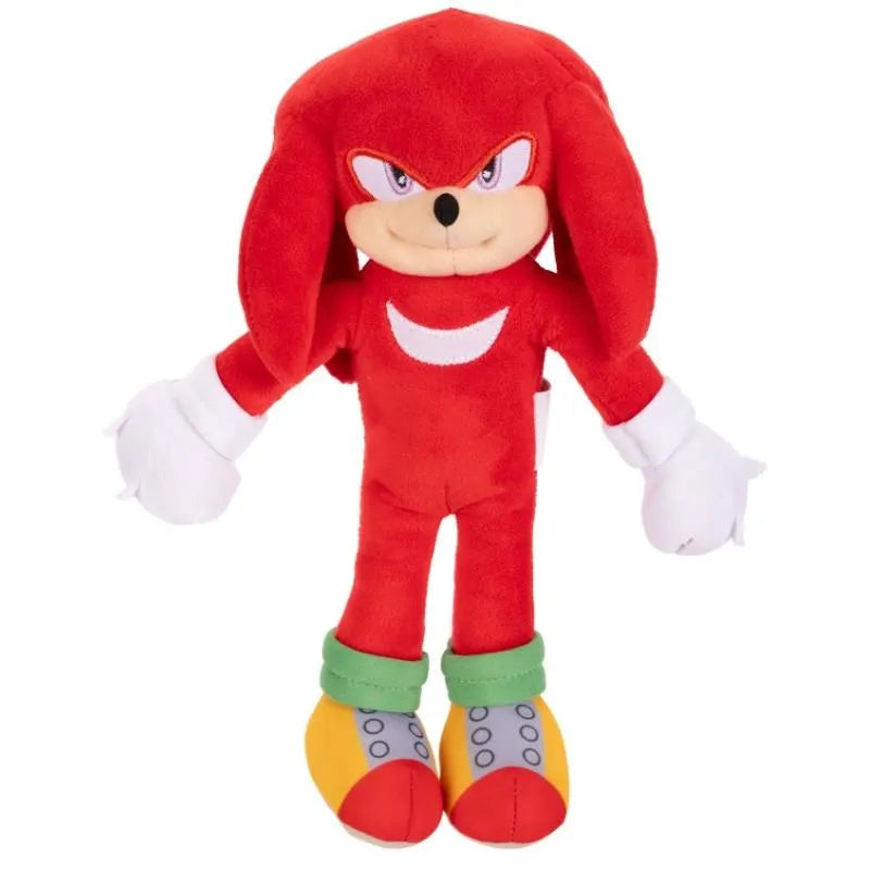 Red plush toy of Knuckles from the Sonic the Hedgehog franchise, featuring a smiling expression and colorful footwear.
