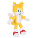 Sonic-themed plush toy resembling Tails, with yellow fur, blue eyes, and red shoes, designed for fans of the Sonic franchise.