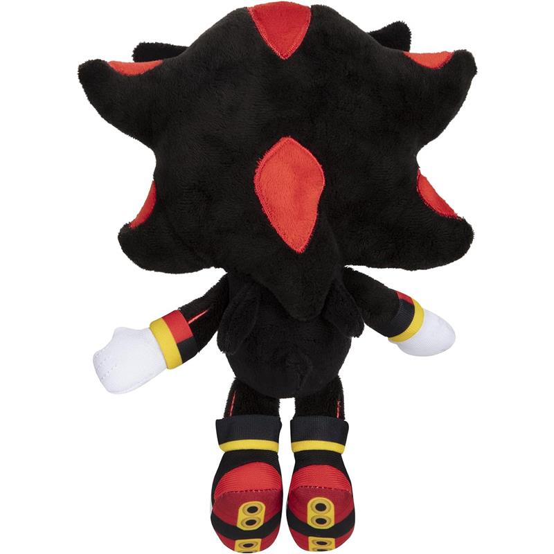 Plush toy of Shadow the Hedgehog, featuring black and red fur, distinct spikes, and colorful shoes.