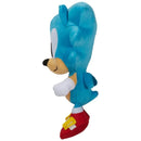 Sonic the Hedgehog plush toy, featuring blue fur, red shoes, and a playful posture, perfect for cuddling.