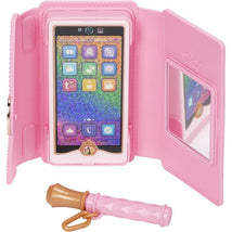 Pink toy phone with a colorful screen displaying app icons, housed in a matching wristlet. Includes a compact mirror and charm.