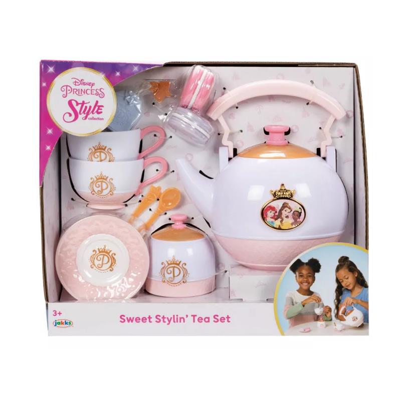 Tea set featuring a teapot, cups, and saucers with Disney Princess designs, packaged in a colorful box. Suitable for ages 3+.