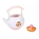 White teapot with a pink handle featuring a princess graphic, accompanied by an orange and pink lid.
