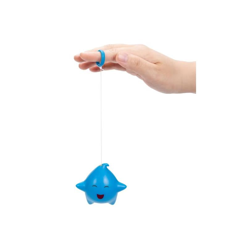 Blue Luma retractable star toy from Super Mario Galaxy, held by a hand with a blue ring; smiling face detail.