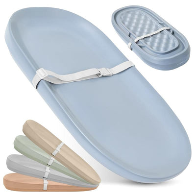 Premium blue changing pad with a safety strap, accompanied by various color options in beige, green, gray, and pink.