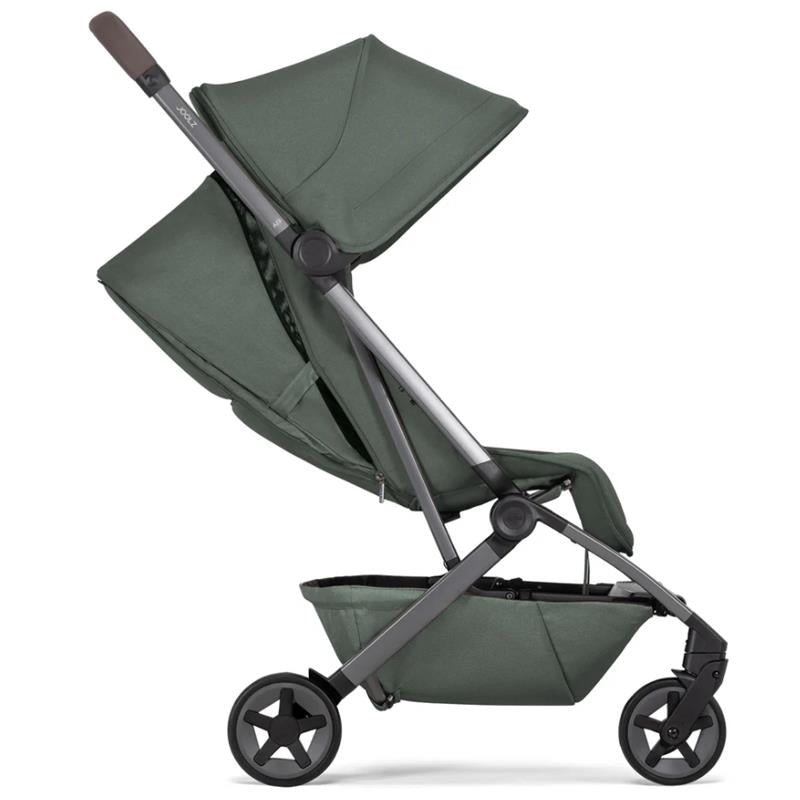 Lightweight compact stroller in forest green with a sleek design, featuring adjustable canopy and modern wheels.