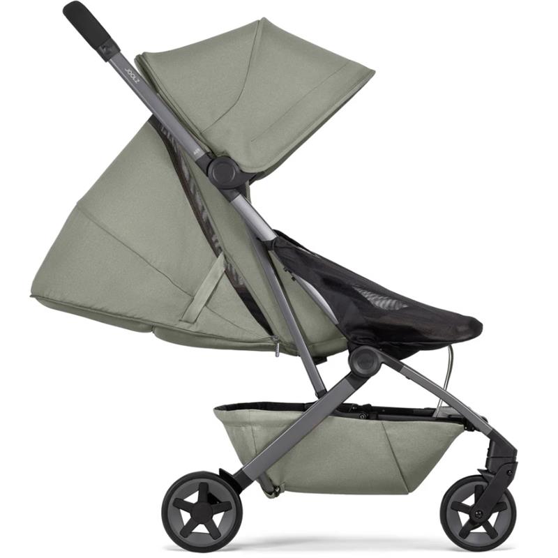 Lightweight compact stroller in sage green with a large canopy, mesh seat, and a storage basket.
