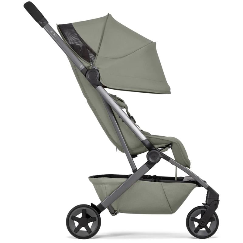 Lightweight compact stroller in sage green, featuring a canopy, five-point harness, and a storage basket.