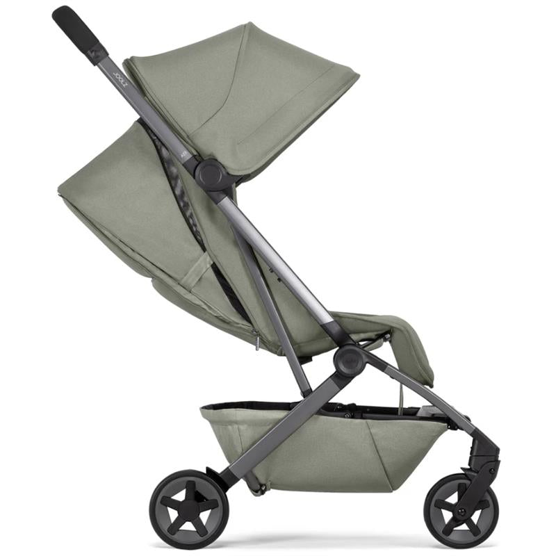 Lightweight Joolz Aer² compact stroller in sage green, featuring a reclining seat and spacious underbasket.
