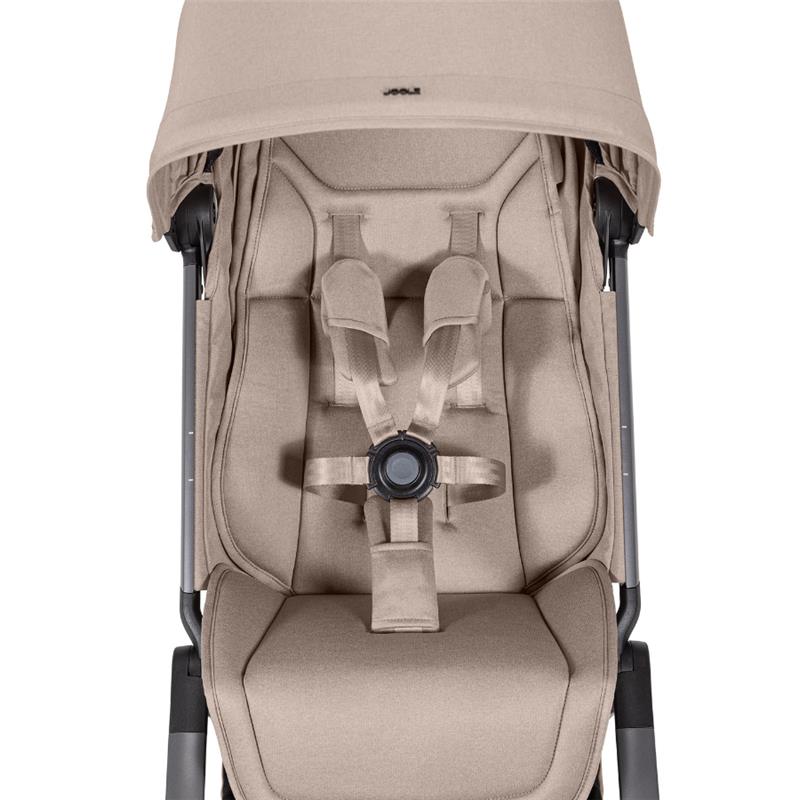 Lightweight compact stroller Joolz Aer² in Sandy Taupe, featuring a padded seat and adjustable harness.