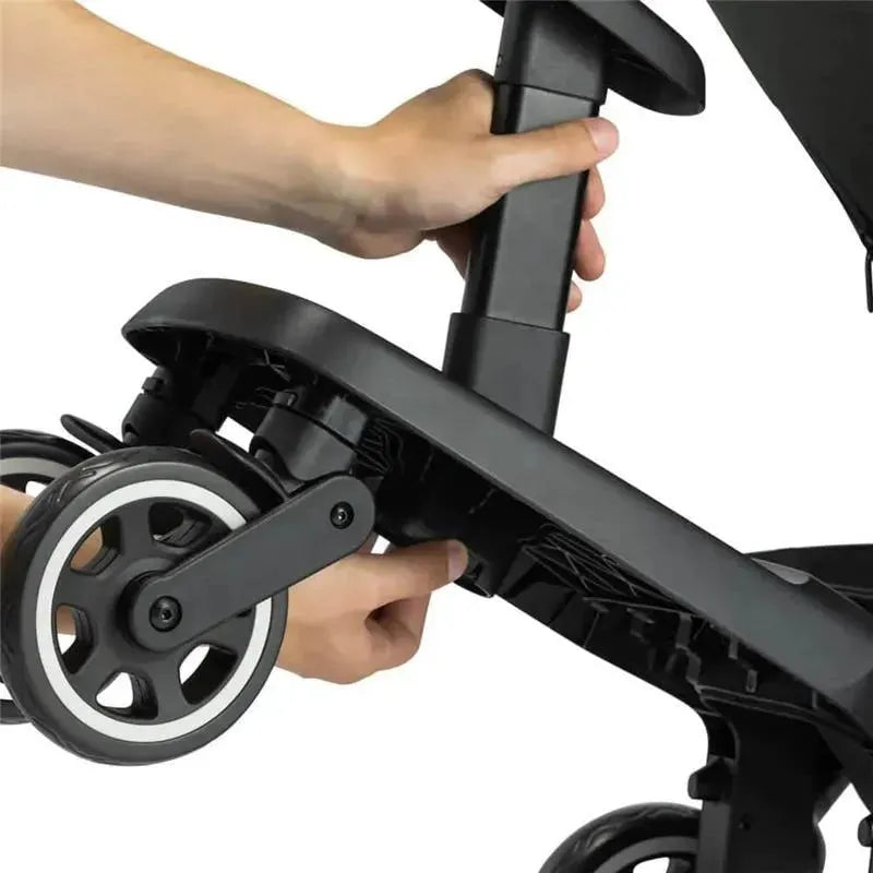 Joolz Aer+ footboard is being attached to a stroller, showcasing the connection mechanism and wheels.