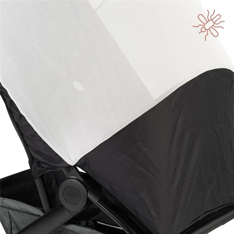 Joolz Aer mosquito net attached to a stroller, featuring a mesh design and a black lower section for insect protection.