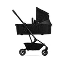 Joolz Aer2 Fold Cot in Space Black, featuring a sleek design, adjustable canopy, and carry handle.