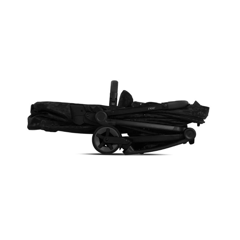 Joolz Aer2 Fold Cot in Space Black, showcasing a compact, folded design with sleek black fabric and wheels.