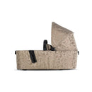 Joolz Aer2 Fold Cot in Chic Renaissance, Taupe, featuring a leopard print design and an adjustable canopy.