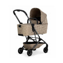 Joolz Aer2 Fold Cot in Chic Renaissance Taupe with a leopard print pattern and a collapsible frame for easy transport.