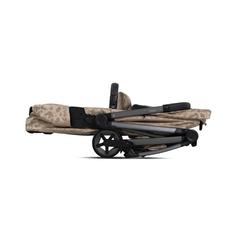 Joolz Aer2 Fold Cot in Chic Renaissance with taupe pattern, displayed in a folded position showcasing its compact design.