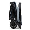 Lightweight Joolz Aer2 stroller in Pebble Grey, shown in a compact, folded position, highlighting its portability.