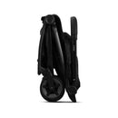 Compact Joolz Aer2 stroller buggy in folded position, featuring a sleek Space Black design and easy-grip handle.