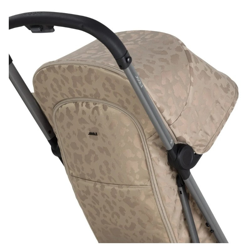 Chic taupe Joolz Aer2 stroller buggy with a subtle leopard print pattern and grey handle.