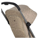 Chic taupe Joolz Aer2 stroller buggy with a subtle leopard print pattern and grey handle.