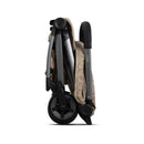 Joolz Aer2 stroller buggy in Chic Renaissance Taupe, displayed in a folded position, highlighting its compact design.