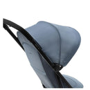 Lightweight Lagoon Blue Joolz Dot stroller showing the canopy and seat design, suitable for travel.