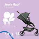 Lightweight Joolz Hub² compact stroller in forest green, showcasing a reclining seat and features for comfort on-the-go.