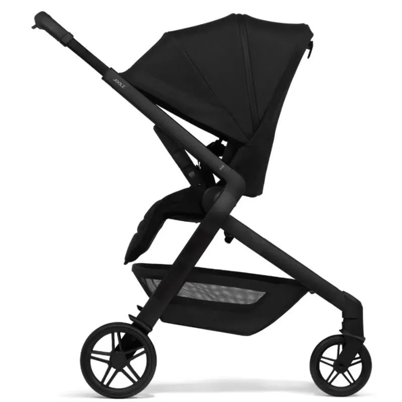 Lightweight Joolz Hub² Compact Stroller in Space Black with a sleek design and a mesh storage basket.
