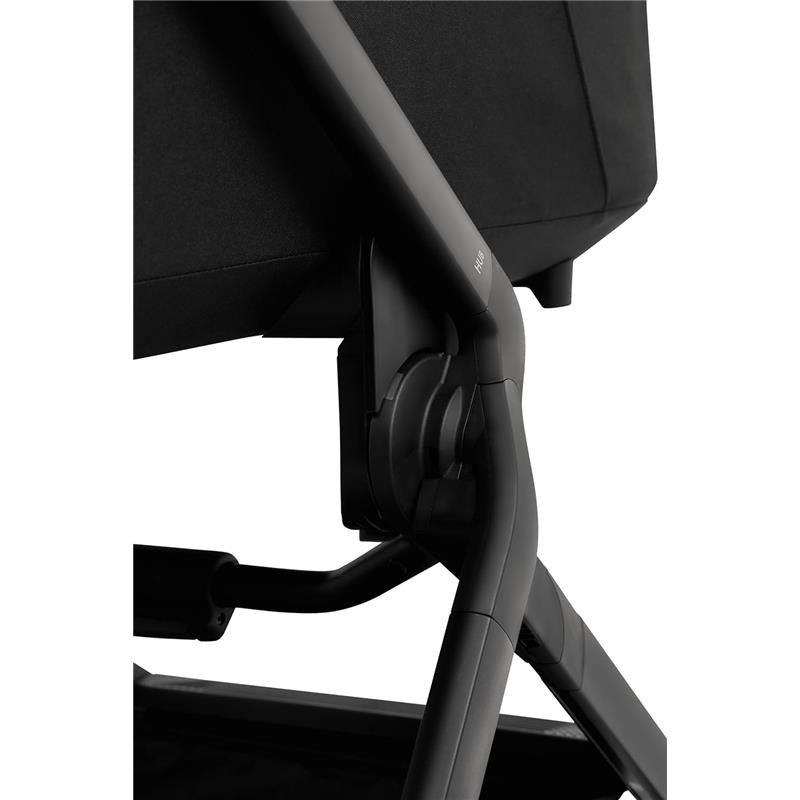 Cot height adapter for Joolz Hub2 stroller, featuring a sleek black design and adjustable mounting mechanism.