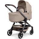 Joolz Hub2 Cot in Sandy Taupe features a lightweight frame, comfortable bassinet, and spacious storage basket.