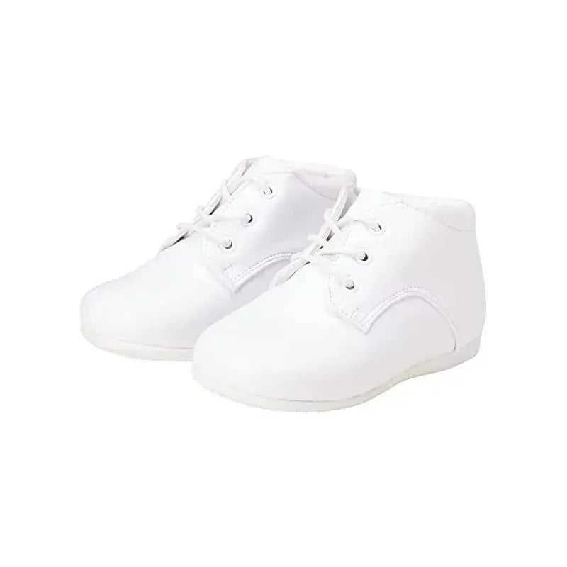 White dress shoes for baby boys, featuring lace-up design and a soft sole, ideal for christening or formal occasions.