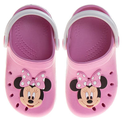 Pink slip-on clogs featuring a Minnie Mouse design, complete with polka dot bow and perforated sides for ventilation.