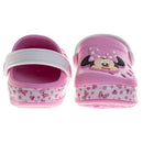 Pink slip-on clogs featuring a Minnie Mouse design, with a polka dot pattern and adjustable back strap.