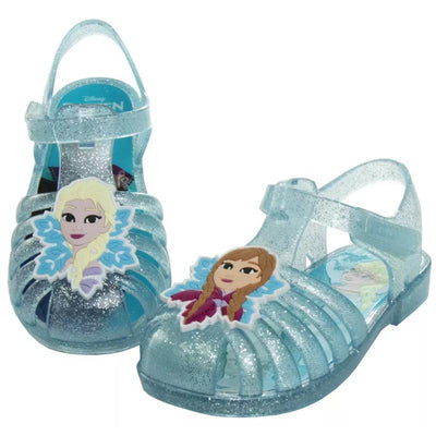 Frozen-themed Josmo jelly sandals in light blue, featuring character designs of Elsa and Anna on the front.