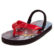 Red Spider-Man themed flip flops for kids featuring a city skyline design on the sole and black strap.