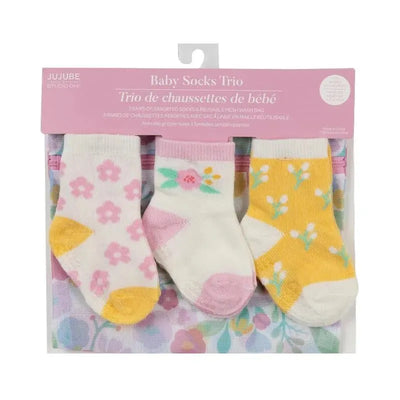 Baby Socks Trio by Jujube featuring three pairs of colorful socks in a reusable mesh bag, decorated with floral patterns.