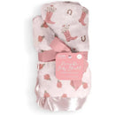 Reversible baby blanket by Jujube featuring a pink floral design and cowgirl boots, tied with a pink ribbon.