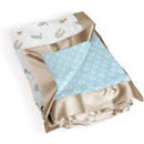 Reversible baby blanket featuring a blue side with horseshoe patterns and a white side with cacti and cowboy boots designs.