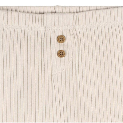 Neutral tan ribbed baby pants featuring a button closure at the waistband.