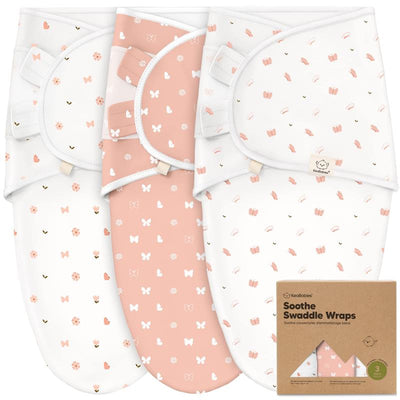 Three Keababies Soothe Baby Swaddles in pink and white with butterfly and flower patterns, designed for newborns 0-3 months.