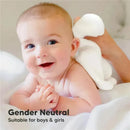 Smiling baby with light skin and short hair holding a white washcloth, promoting Keababies gender-neutral baby washcloths.