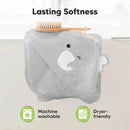Hooded gray baby towel shaped like an elephant, highlighting features: machine washable and dryer-friendly. Bamboo brush on top.