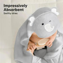 Hooded gray baby towel with an elephant design, featuring text about its absorbency and a child holding a brush.